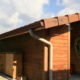 Gouttière alu sur mesure isère sur maison bardage bois.